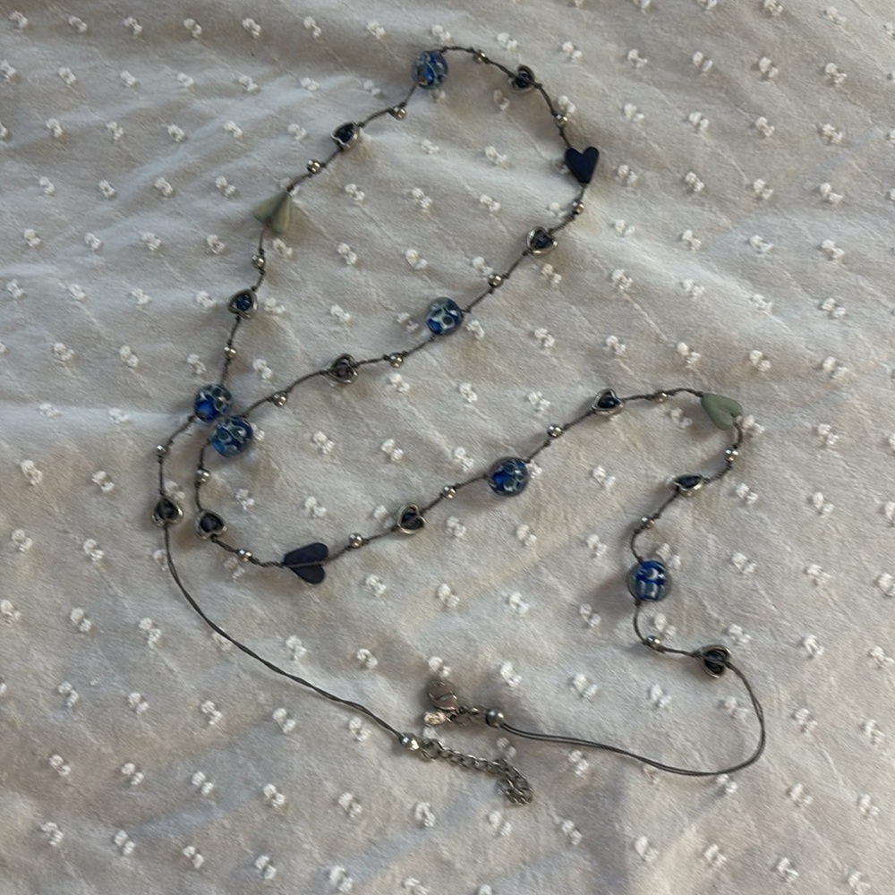 Blue, long, glass bead and hearts necklace from nice UK store. Barely worn.